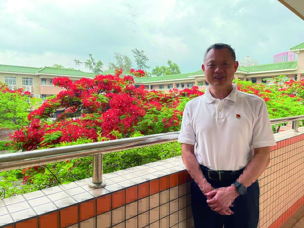 共生阅读：学校教育生态的自我构建——访广州市华侨外国语学校校长许昌良